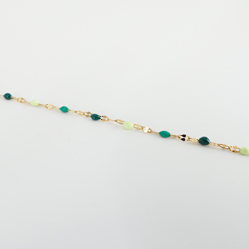 Bracelet acier doré perles vertes ou bleues