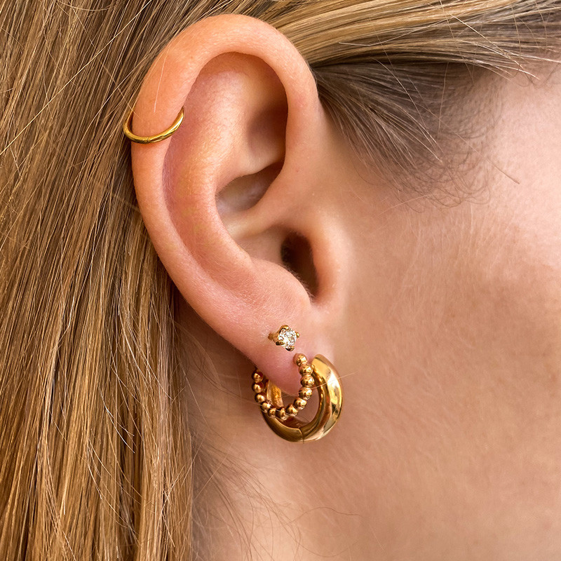 Clous d'oreilles plaqué or solitaire