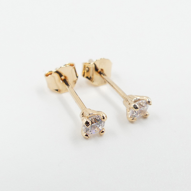 Clous d'oreilles plaqué or solitaire