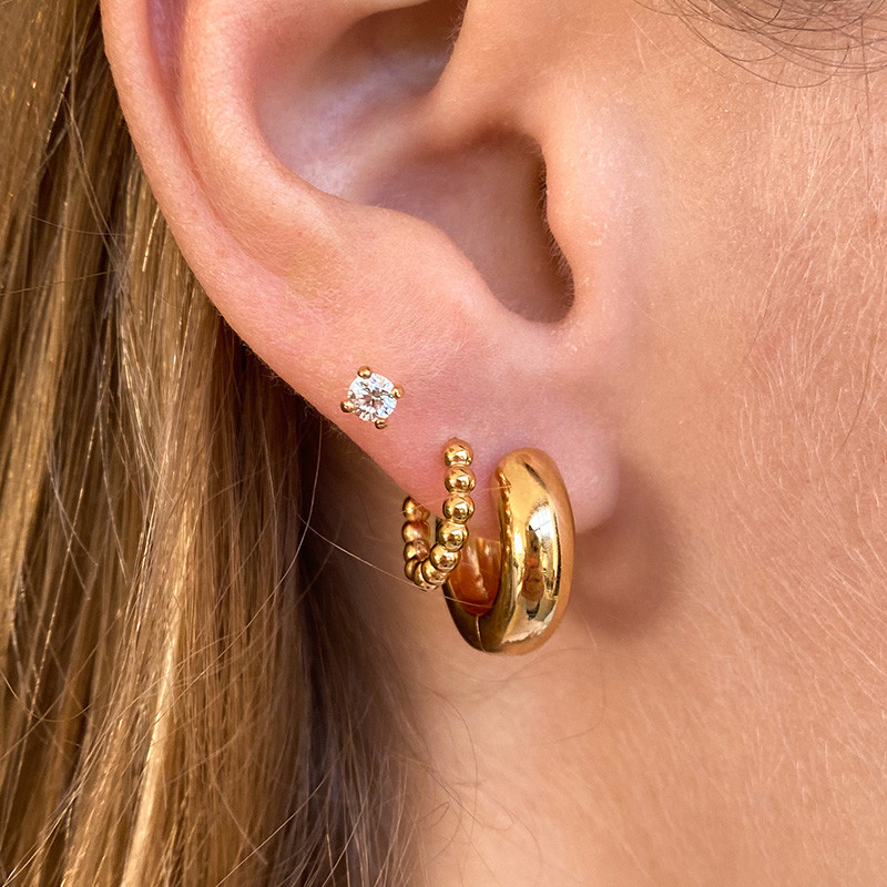 Clous d'oreilles plaqué or solitaire