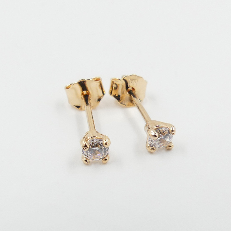 Clous d'oreilles plaqué or solitaire