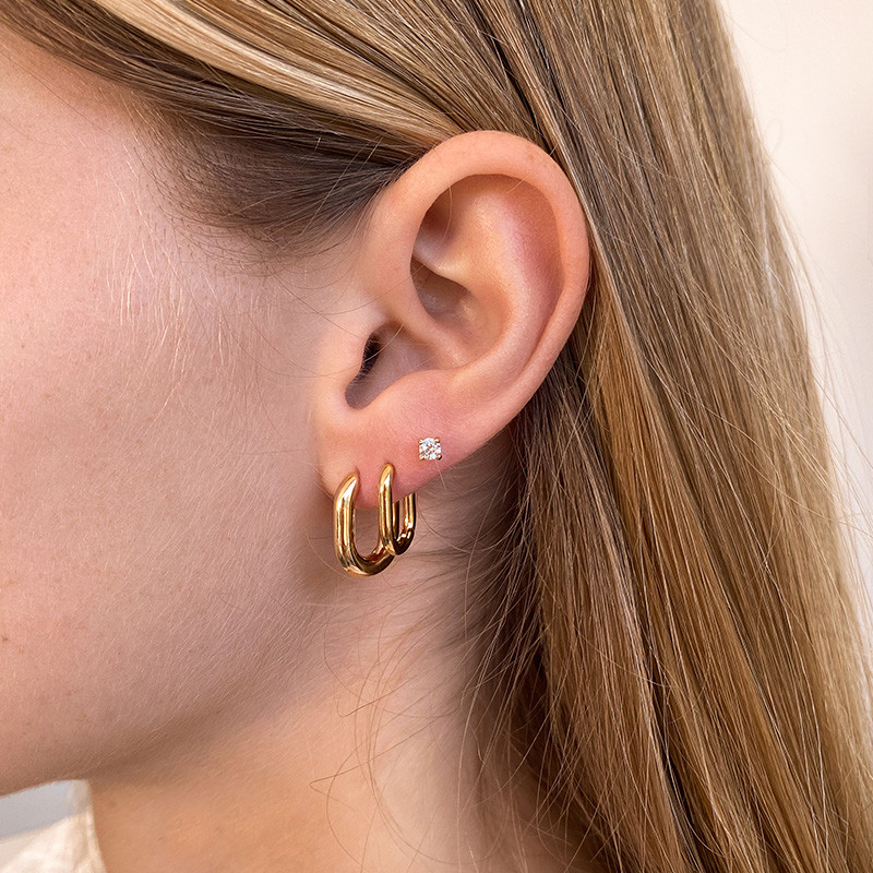 Piercing doré solitaire strass