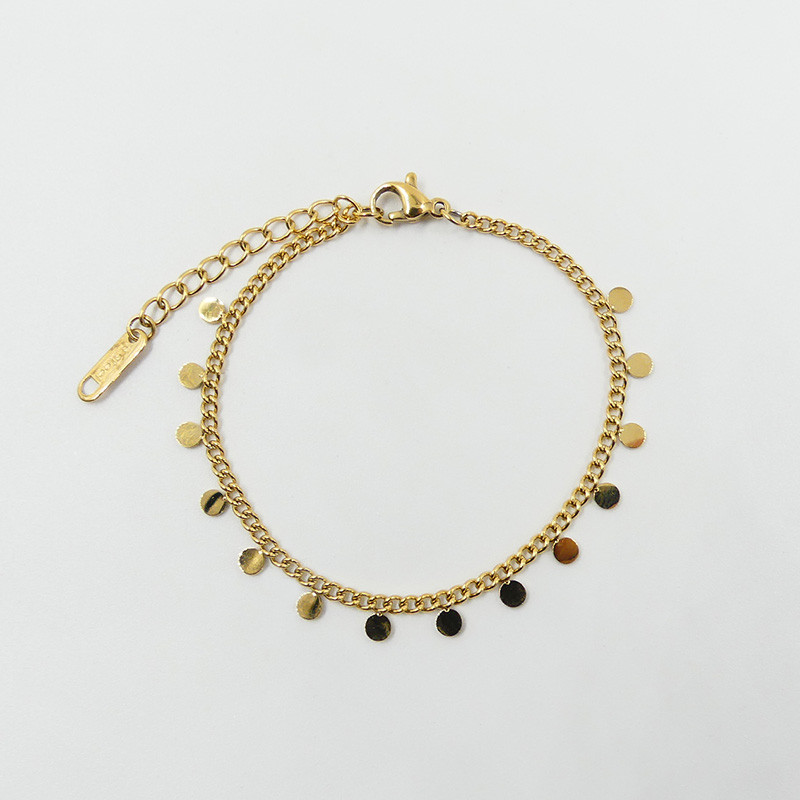 Bracelet chaine dorée à breloques rondes