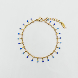 Bracelet acier dorée avec gouttes bleues