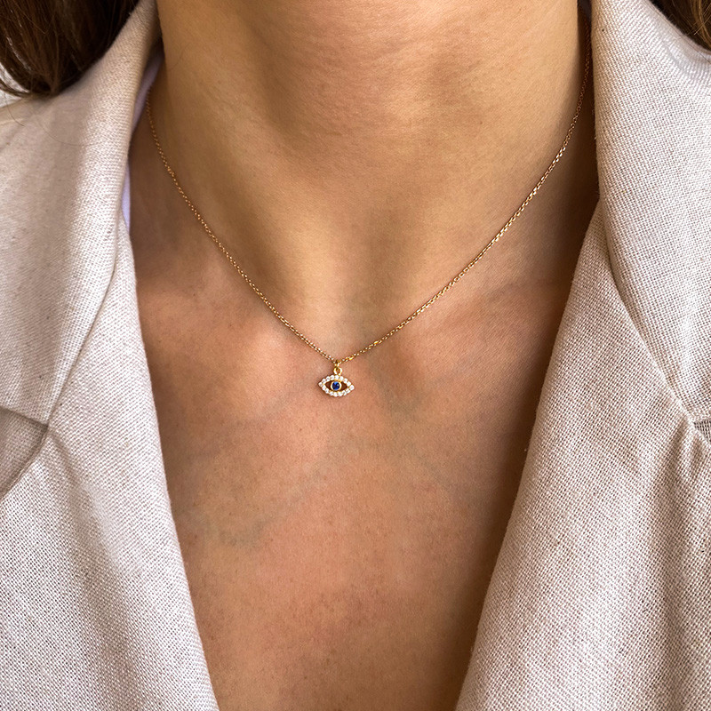 Collier plaqué or pendentif oeil strass