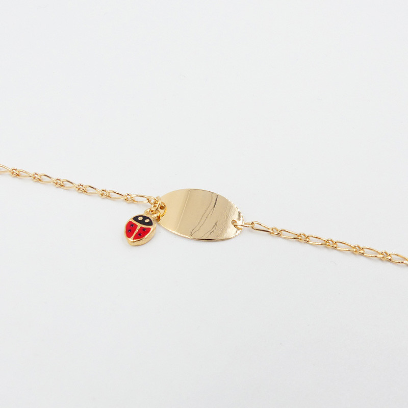 zoom sur la gourmette enfant coccinelle