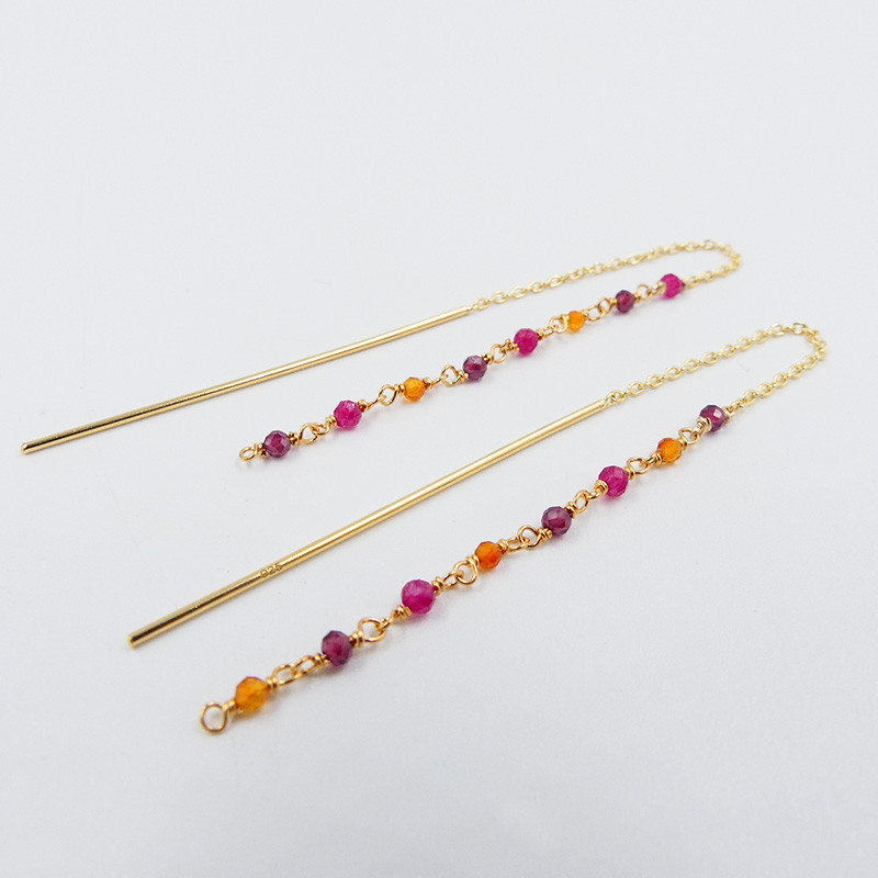 Boucles d'oreilles dorées pendantes pierres