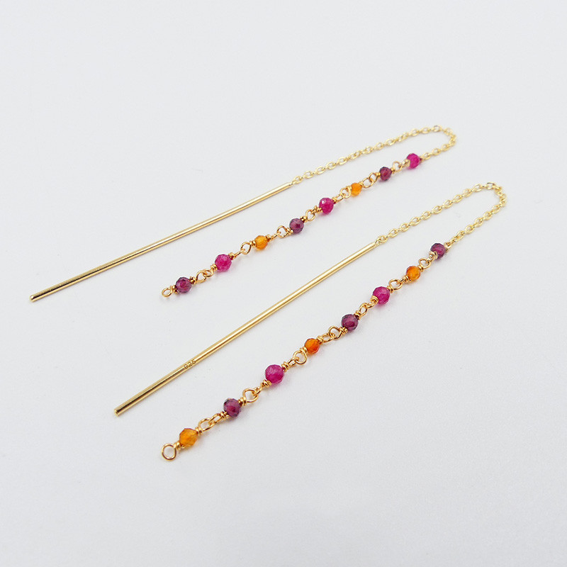 Boucles d'oreilles dorées pendantes pierres