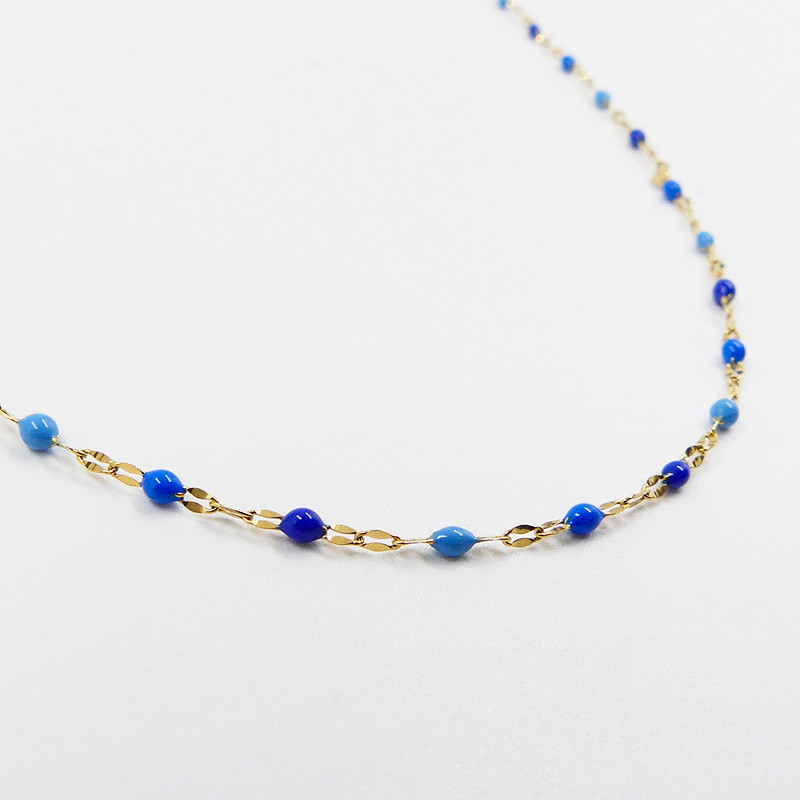 Collier acier doré perles vertes ou bleues