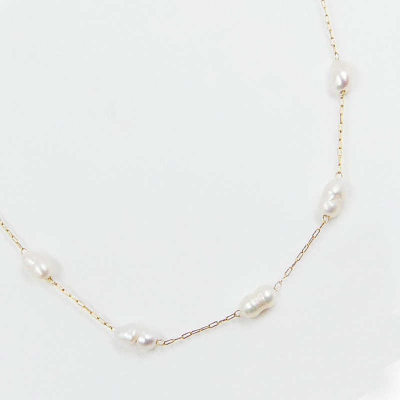 Collier acier doré perles d'eau douce