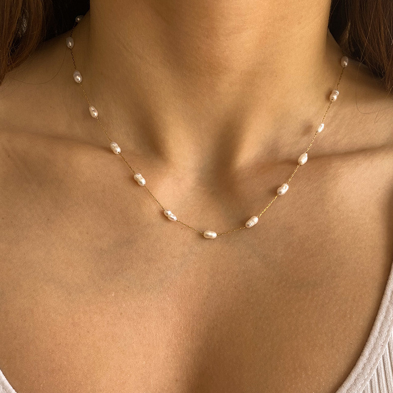 Collier acier doré perles d'eau douce