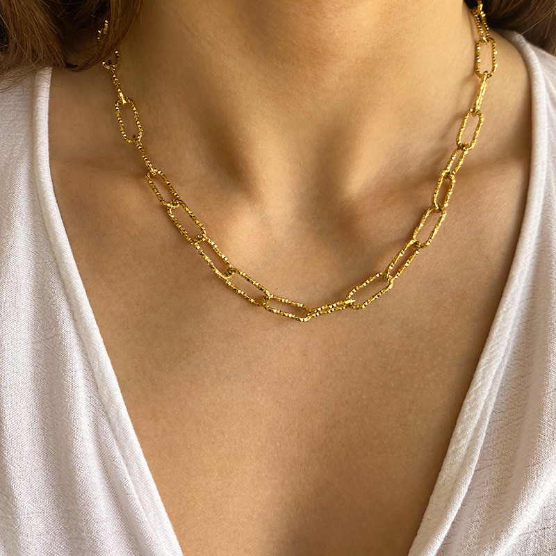 Collier acier doré maille allongée