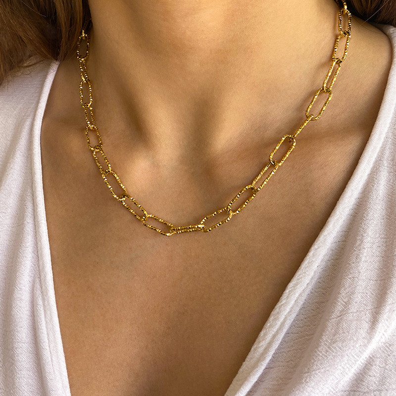 Collier acier doré maille allongée