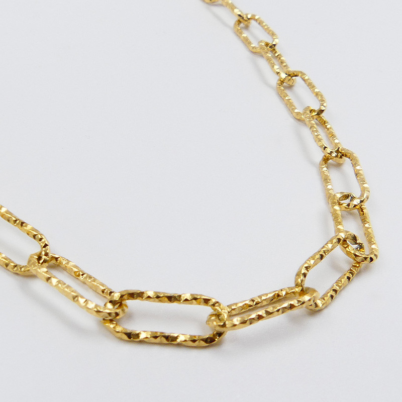 Collier acier doré maille allongée