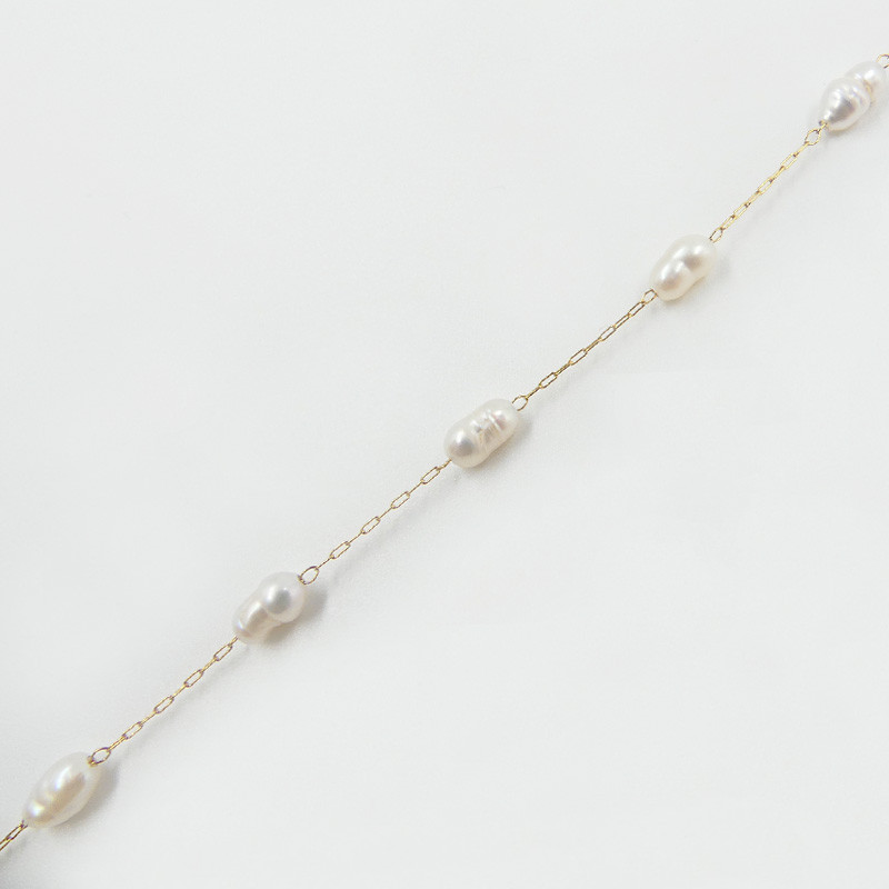 Collier acier doré perles d'eau douce