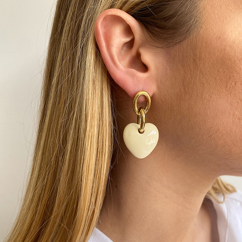 Boucles d’oreilles acier doré coeur blanc