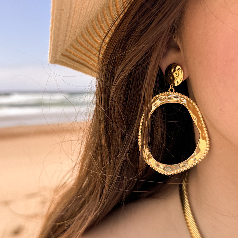 Boucles d’oreilles acier pendantes ronds