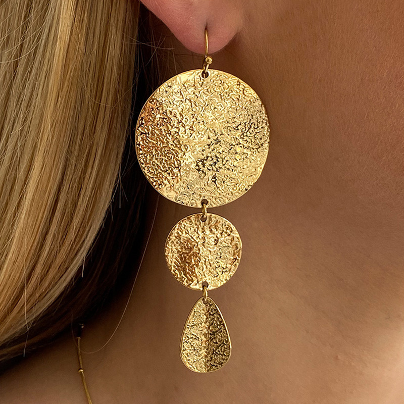 Boucles d’oreilles acier pendantes solaire