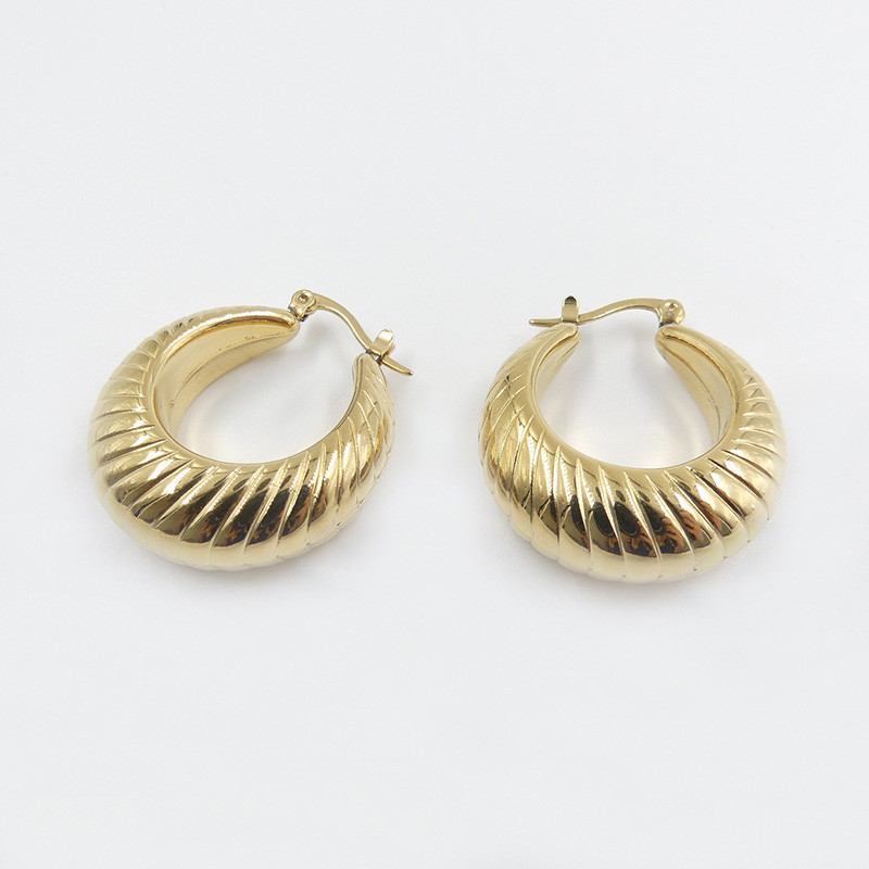 Créoles acier doré épaisses texturées