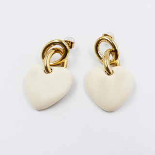 Boucles d’oreilles acier doré coeur blanc