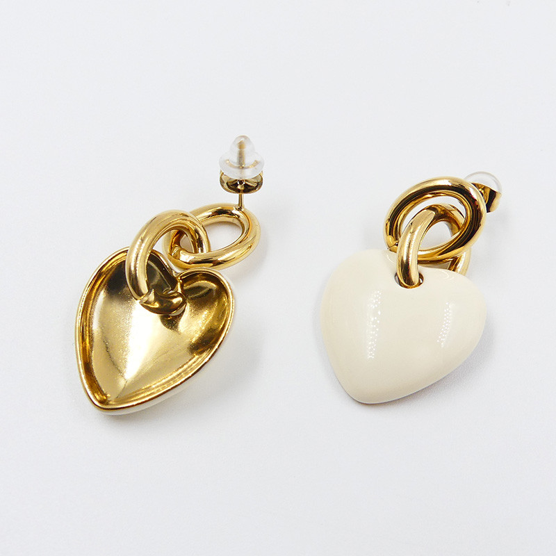 Boucles d’oreilles acier doré coeur blanc