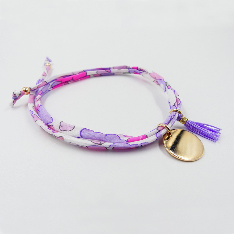 Bracelet Cordon Liberty doré médaille et pompon