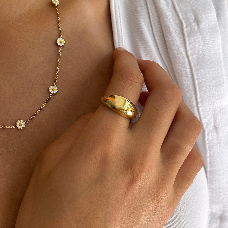 Bague acier doré bombée ajustable