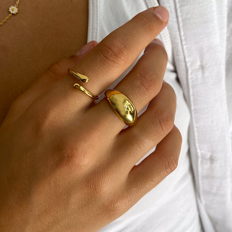 Bague acier doré bombée ajustable