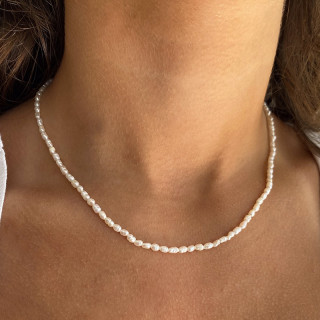 Collier acier doré perles d’eau douce