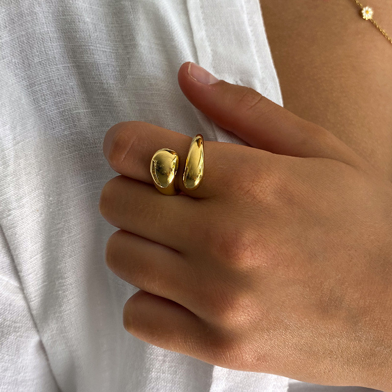 Bague acier doré enlacée ajustable