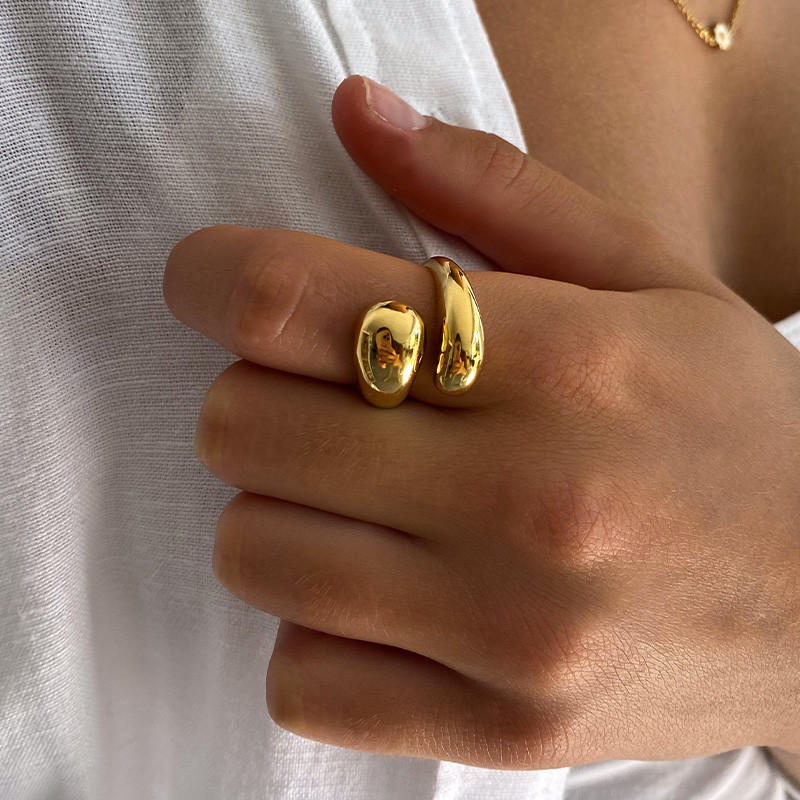 Bague acier doré enlacée ajustable