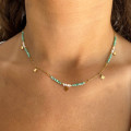 Collier acier doré perles et étoiles