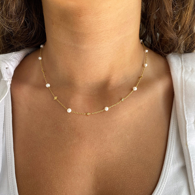 Collier acier doré perles de culture et étoiles
