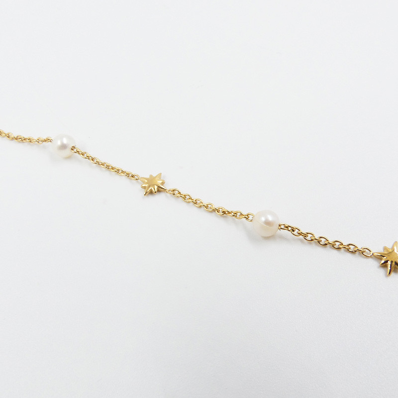 Bracelet acier doré perles de culture et étoiles