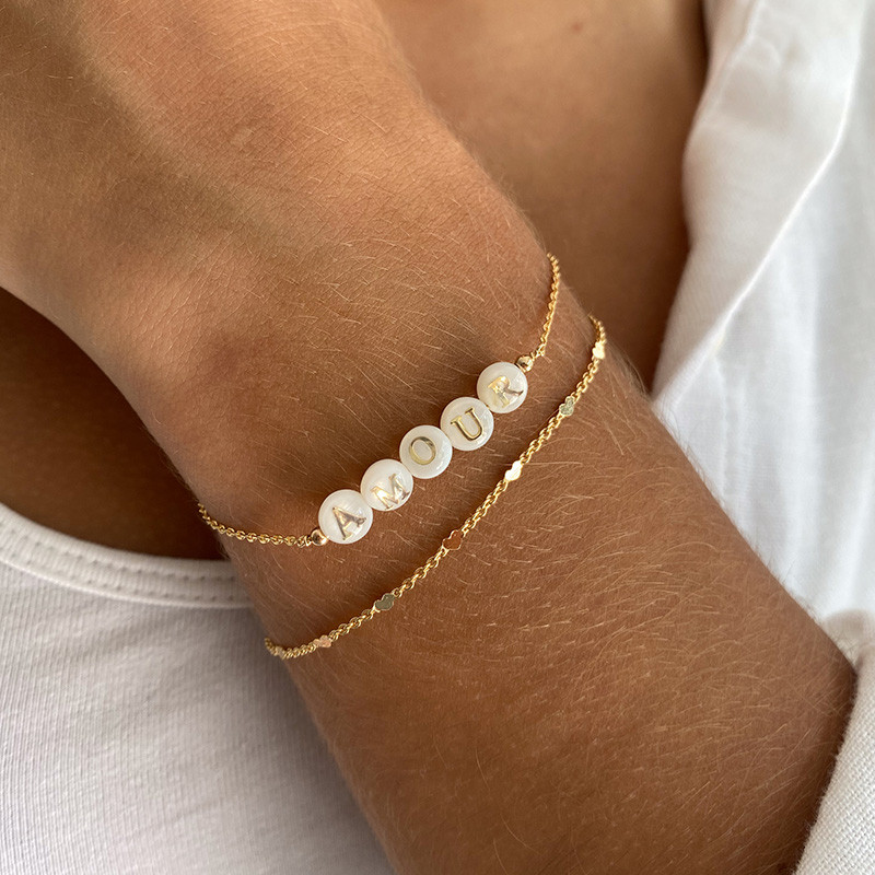 Bracelet plaqué or avec petits coeurs