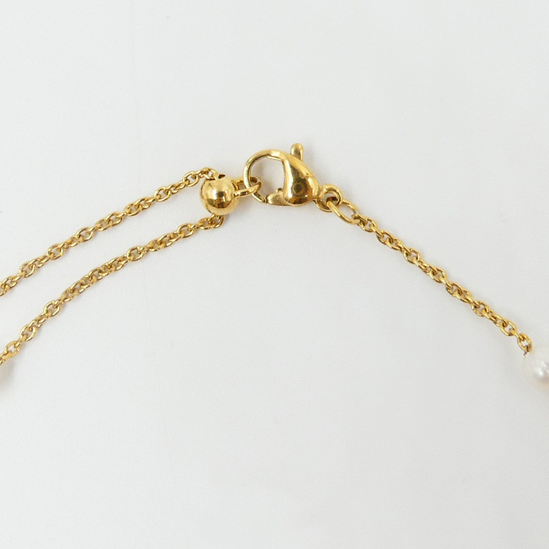 Collier acier doré perles de culture et étoiles