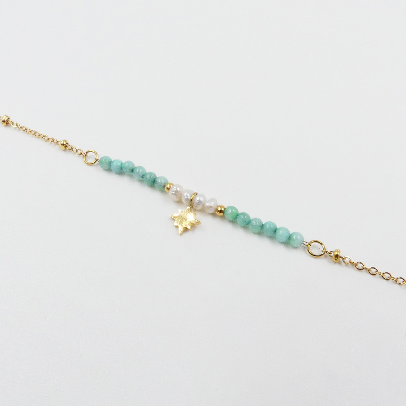Bracelet acier doré perles et étoiles