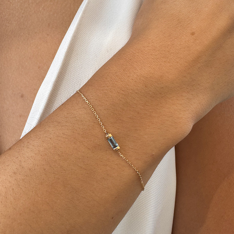 Bracelet or 18 carats baguette Topaze Bleue