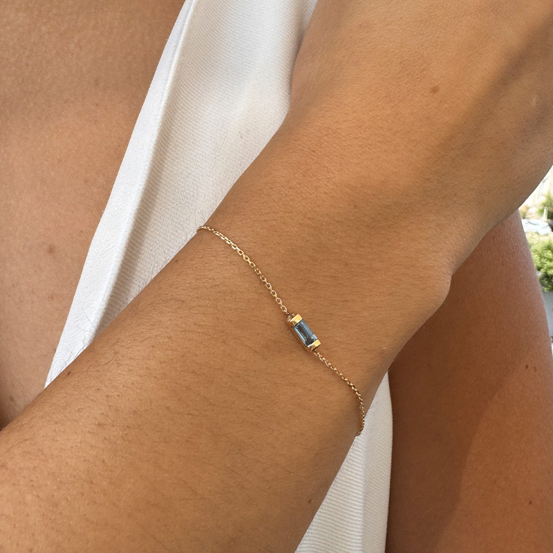 Bracelet or 18 carats baguette Topaze Bleue