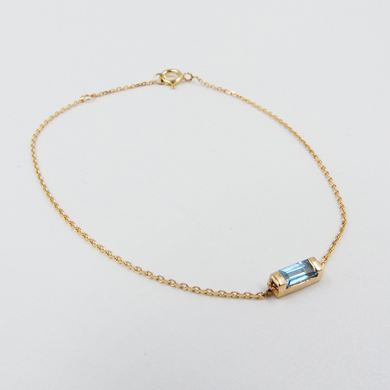 Bracelet or 18 carats baguette Topaze Bleue