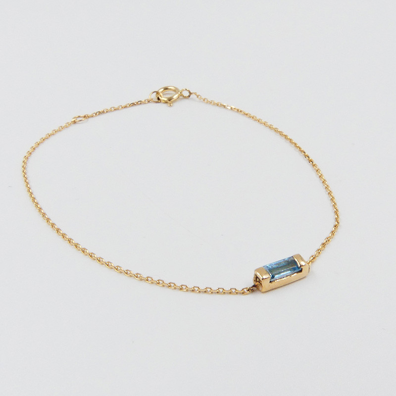 Bracelet or 18 carats baguette Topaze Bleue