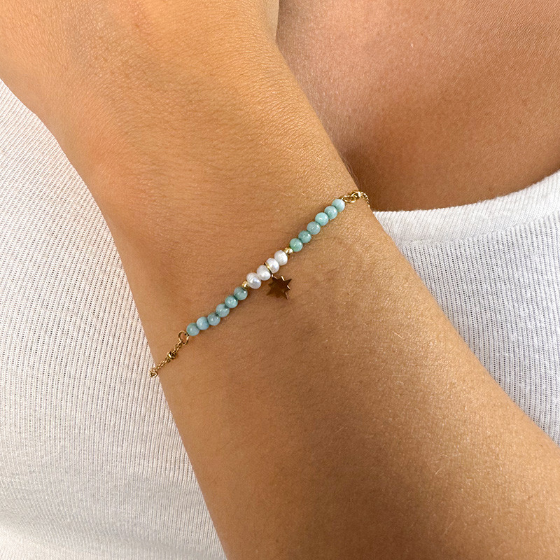 Bracelet acier doré perles et étoiles