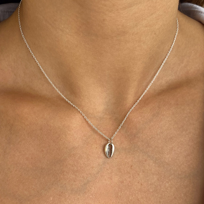 Charm's Argent Cauri