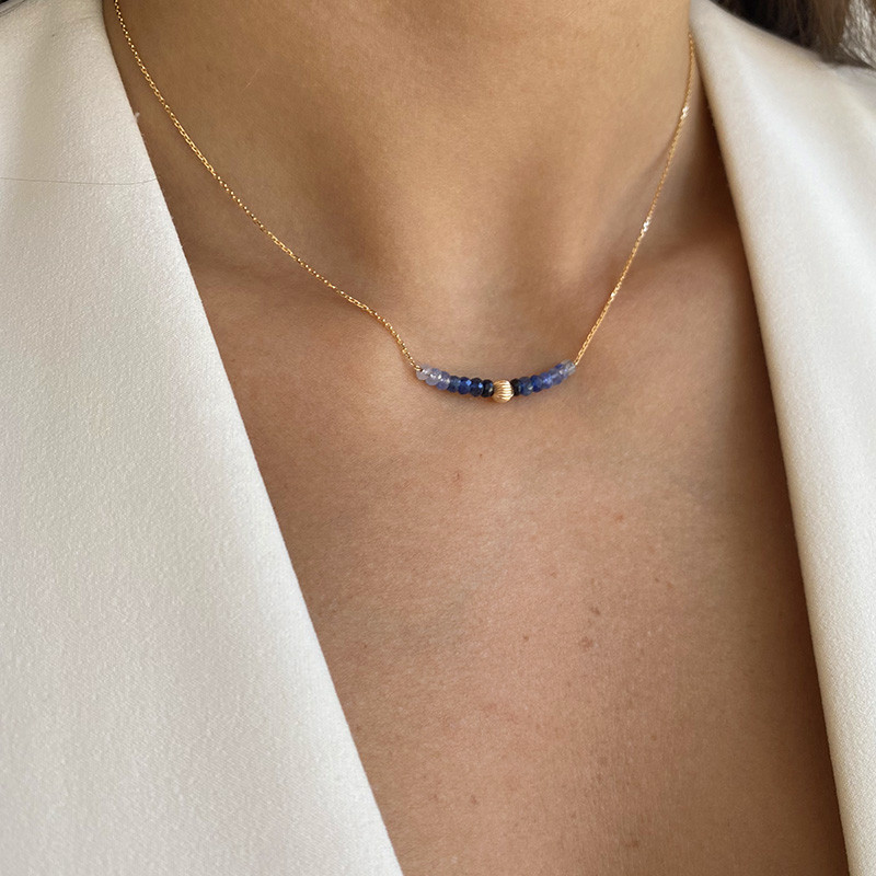 Collier or 18 carats et saphir