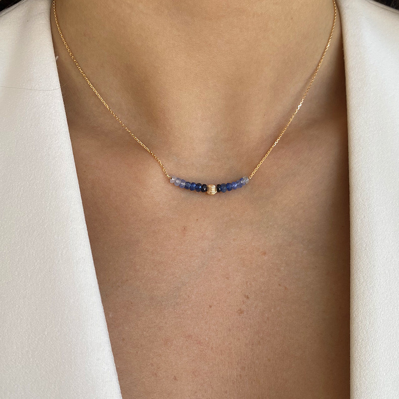 Collier or 18 carats et saphir