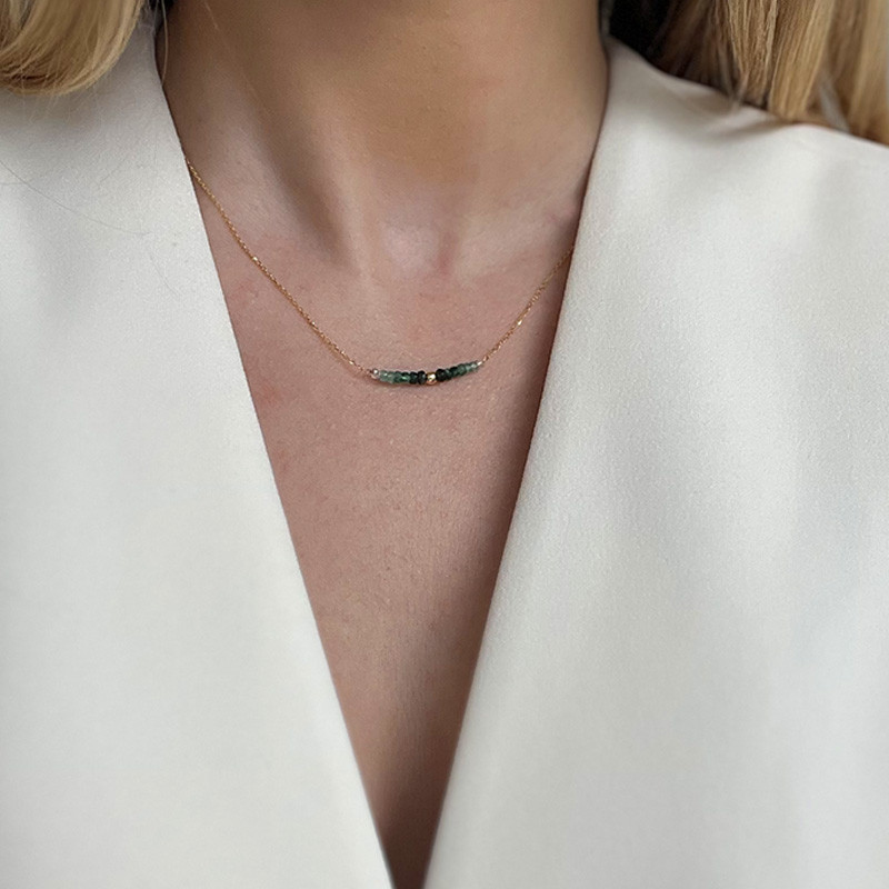 Collier or 18 carats et émeraude