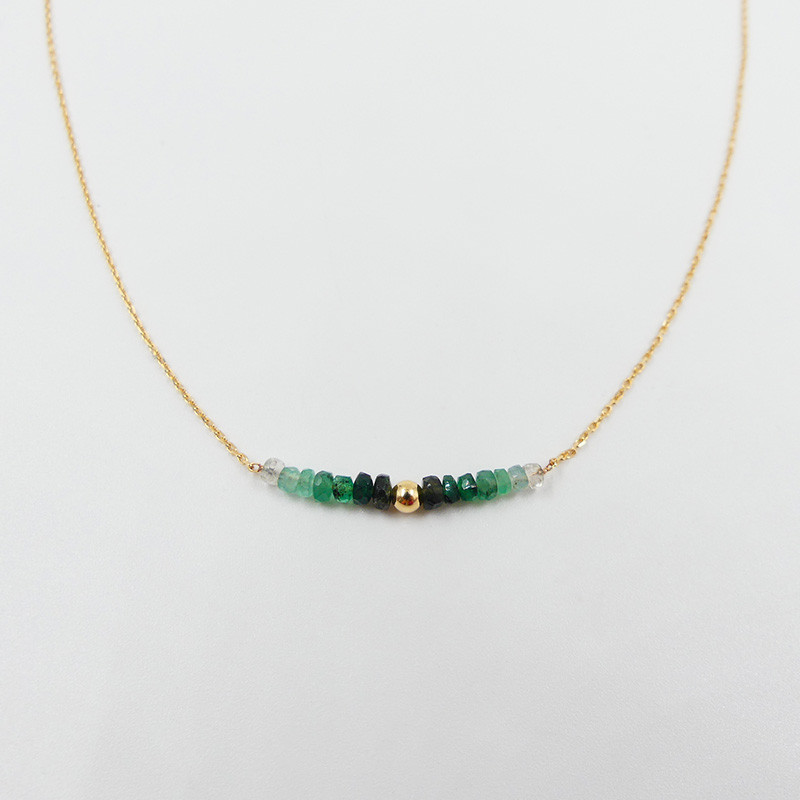 Collier or 18 carats et émeraude