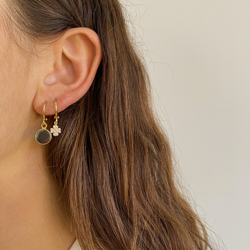 Boucle à l'unité dorée trèfle strass