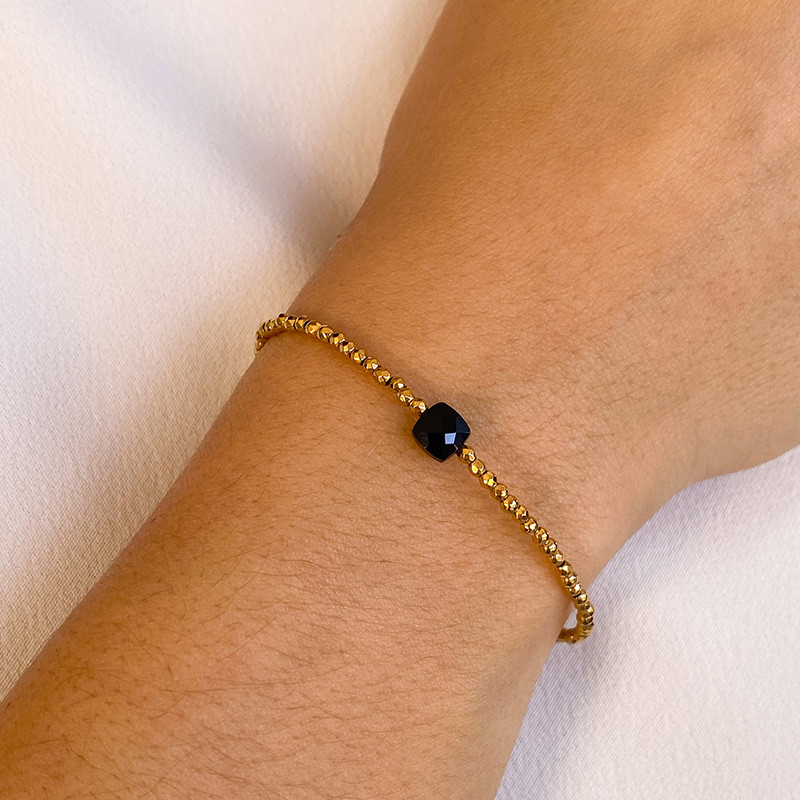 Bracelet fin doré et Onyx Noir