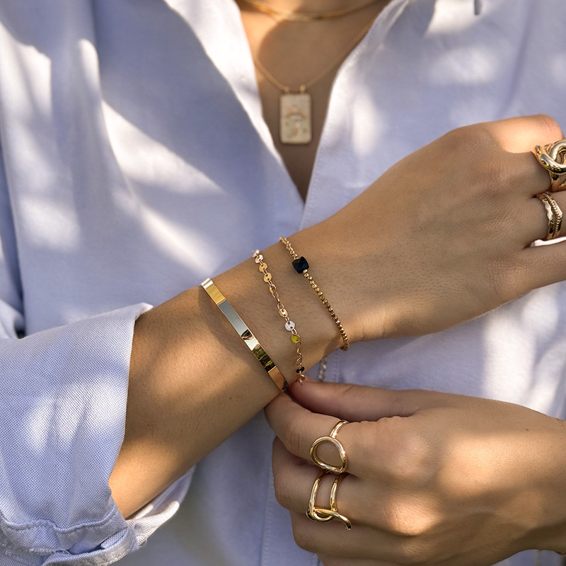 Bracelet fin doré et Onyx Noir